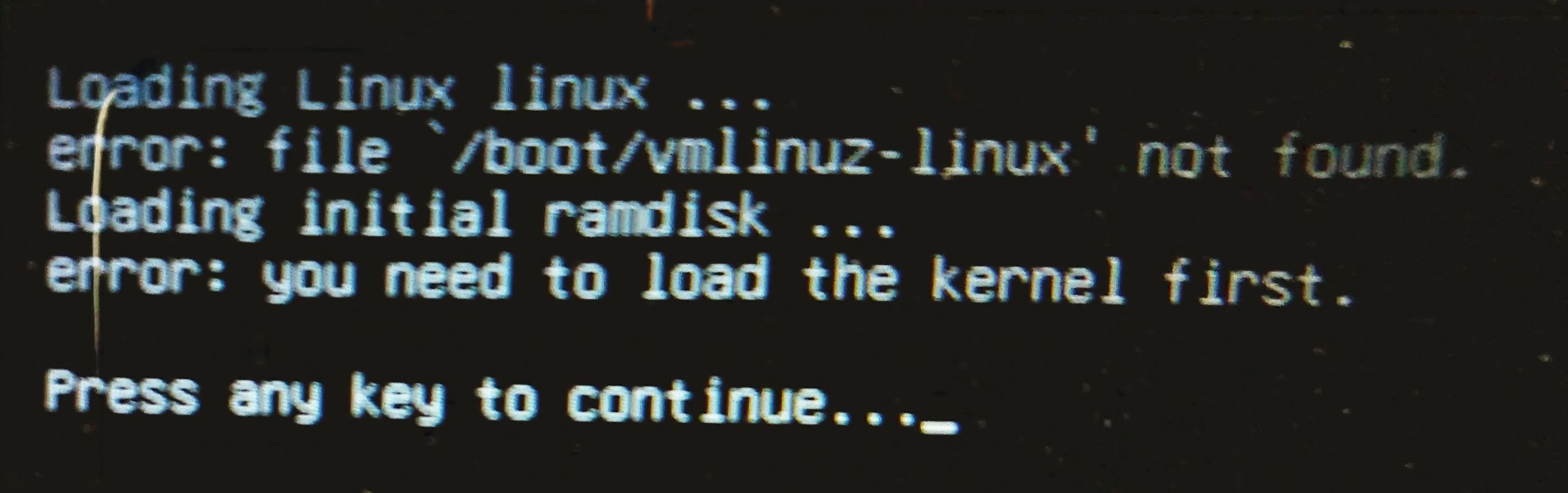 white text on a black screen saying Loading Linux linux … error: file /boot/vmlinuz-linux not found. Loading initial ramdisk … error: you need to load the kernel first.